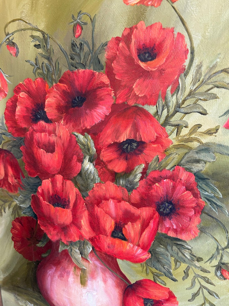 May include: A vibrant painting of a bouquet of red poppies in a pink vase. The flowers have dark centers and are surrounded by green leaves. The background is a soft, muted green.