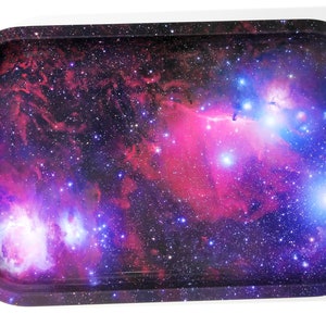 May include: A metal rolling tray with a galaxy print featuring pink, blue, and purple nebulae against a black background.
