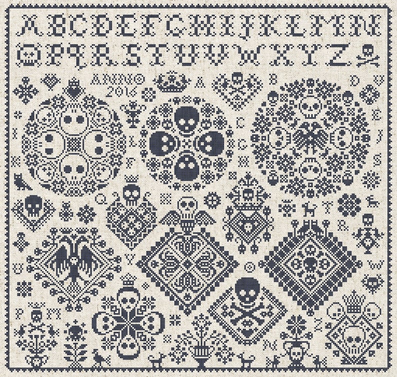 May include: A cross-stitch sampler featuring a variety of gothic and macabre motifs. The design includes skulls, crowns, and floral elements, all rendered in dark blue thread on a cream-colored fabric. The sampler also includes the alphabet and the year 2016.
