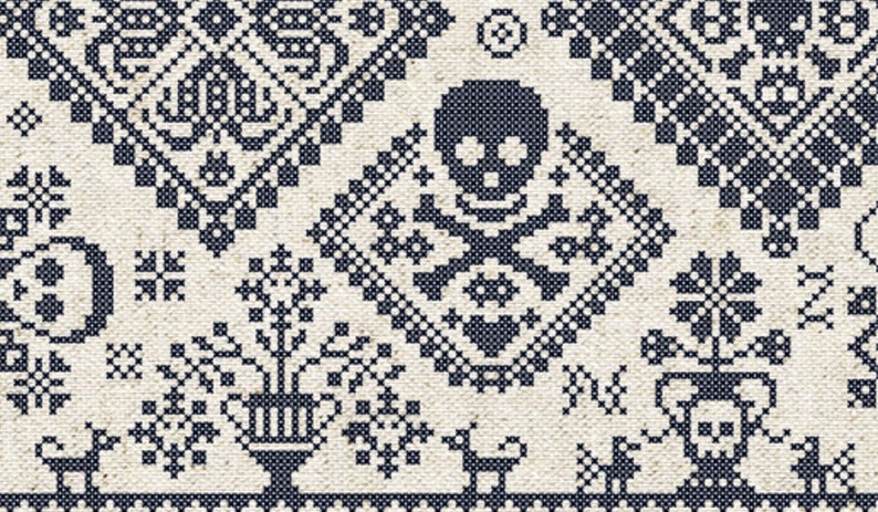 May include: A detailed cross-stitch pattern in navy blue on an off-white background. The design features geometric shapes, floral motifs, and a central skull and crossbones symbol. The overall aesthetic is reminiscent of traditional folk art.