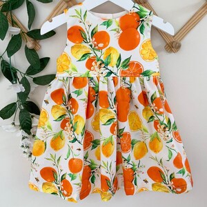 strapless open back dress Girls: at This Time Orange Tiger Print Dress, (14/16) - The Mint Julep Boutique
