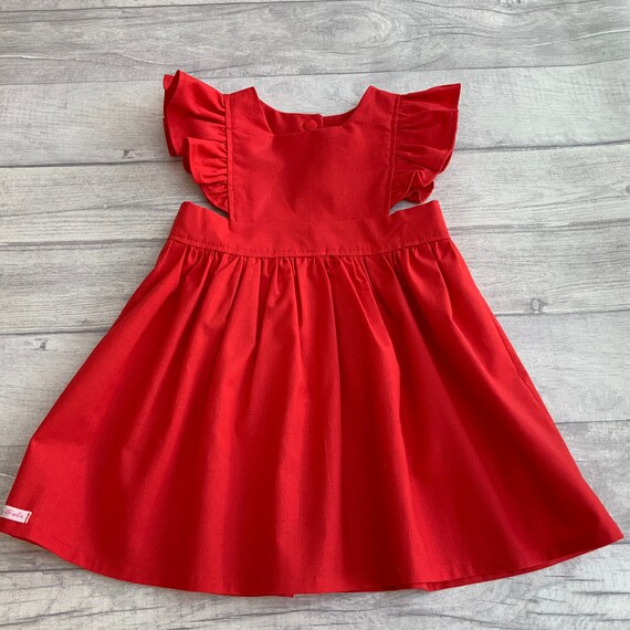 Ladies red shop pinafore dress