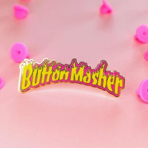 Button Masher Gaming Enamel Pin - Cute Enamel Pin for Fans of Winning at Fighting Games and Arcade Games, Perfect Pin Gift for Gamer Friends