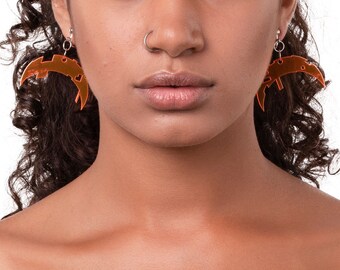 Clear neon orange acrylic moon glitch earrings