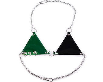 May include: A silver chain necklace with two triangular pendants. One pendant is green and the other is black.