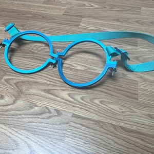 Dull Breast Harness Clamps Attached to Nylon Bondage Webbing - Colors Rainbow