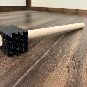 The Meat Hammer Impact Paddle Toy Spiked