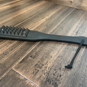 Spiked Faux Leather Paddle