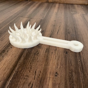 Tentacle Monster Paddle Spiked Toy - Some colors GLOW