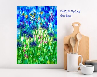 Tea towel featuring Soft & Spiky design by Millie Moth, an alcohol ink painting of colourful wild blue flowers, kitchen decor, flower lover