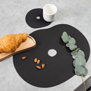 Black leather placemats and coasters