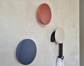 Round wall hook in blue, terracotta, cream colors