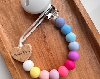 Personalised Pastel Rainbow Silicone Dummy Clip: Engraved Pacifier Holder