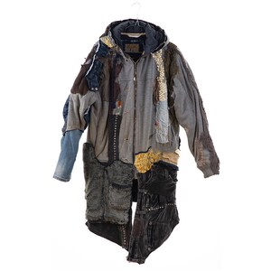 May include: A grey hooded jacket with a zip fastening, made from various recycled fabrics, including denim, corduroy, and knit. The jacket has a patchwork design with different textures and colours.