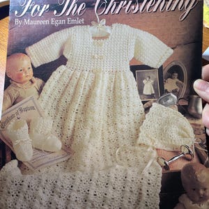 May include: A set of three ceramic mugs with a speckled, matte finish. The mugs are in shades of cream, light gray, and dark gray. Each mug has a simple, minimalist design and a rounded handle.