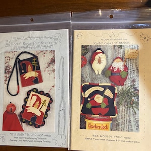 May include: Two craft patterns for making Christmas ornaments and a pillow. The patterns are titled "It's Saint Nicholas" and "Wee Wooley Folk" and are from Reets' Rags To Stitches.
