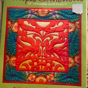 May include: A quilting pattern titled "Simple Silhouette" with a folk art design featuring a red, yellow, and green floral motif. The pattern is for an 18-inch quilt and is titled "Folk Art Paradise Garden".
