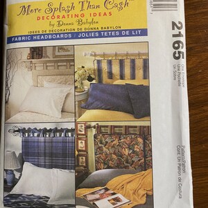May include: McCall's sewing pattern for fabric headboards. The pattern includes instructions for creating three different styles of headboards: a plaid headboard with a blue and white pattern, a floral headboard with a brown and yellow pattern, and a solid headboard with a white and blue pattern. The pattern is titled "More Splash Than Cash" and is by Donna Babylon.
