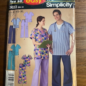 May include: Simplicity sewing pattern 3633 for medical scrubs. The pattern includes illustrations of scrubs in various colors, including blue, purple, and patterned designs. The size range is XS-XL. The pattern also features the text "It's so easy".