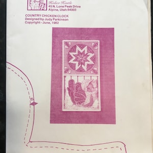 May include: A pink and white pattern for a country chicken clock. The pattern includes a rooster, a star, and a clock face. The pattern is titled "Country Chicken Clock" and is designed by Judy Parkinson. The copyright date is June 1982.