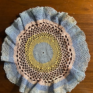 Crocheted Doily Vintage with Ruffle edge. 11&quot; Diameter Circle. Multi colored pastels Yellow | Pink | Blue around Outer edge