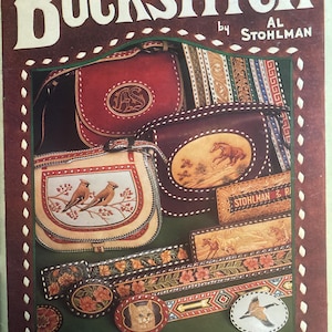 May include: A vintage book cover titled "How to Buckstitch" by Al Stohlman. The cover showcases leatherwork examples, including purses, belts, and decorative elements with floral, bird, and horse designs. The colour scheme includes red, brown, and green.