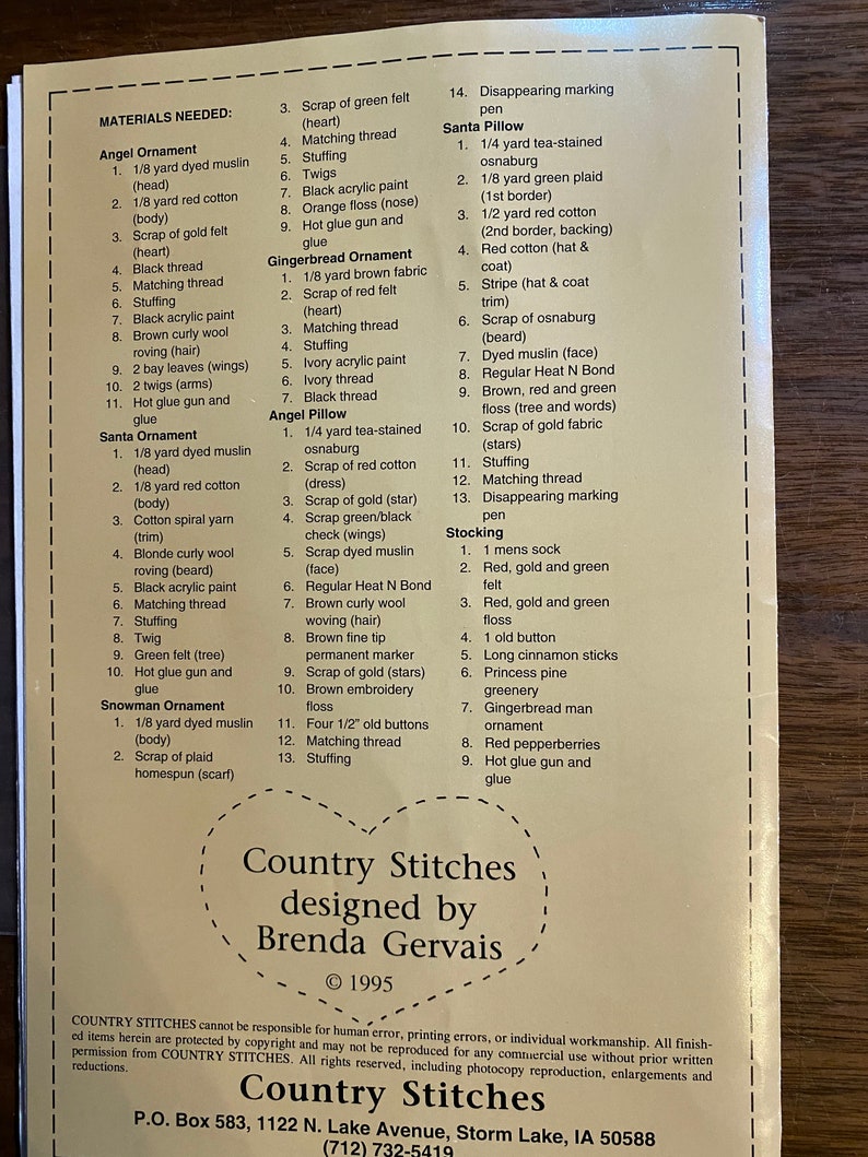 May include: A printed pattern for a gingerbread ornament, angel ornament, Santa ornament, and Santa pillow. The pattern includes a list of materials needed for each project, including fabric, thread, stuffing, and other embellishments. The pattern is titled "Country Stitches designed by Brenda Gervais" and is copyrighted 1995.