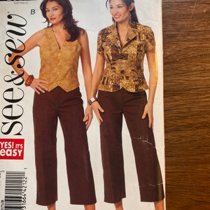 May include: A sewing pattern for a brown vest and a brown top with a patterned design. The pattern is labeled "B5171" and "see & sew" with the text "YES! IT'S easy".
