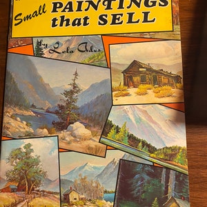 May include: A book titled "Small Paintings that Sell" by Lola Aldes. The cover features a collage of six landscape paintings in various styles and colours. The book is published by Walter T. Foster.