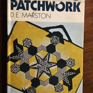 May include: A book titled "Exploring Patchwork" by D.E. Marston. The cover features a yellow and black patchwork design with a star in the center.