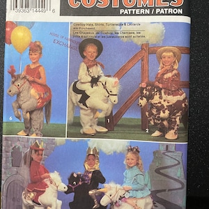 May include: A sewing pattern for children's costumes. The pattern includes five different costumes: a cowboy, a cowgirl, a knight, a princess, and a unicorn rider. The pattern is from Simplicity and is number 8586.