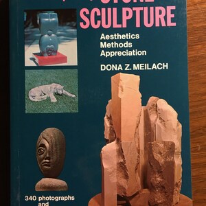 May include: Book cover for "Contemporary Stone Sculpture: Aesthetics, Methods, Appreciation" by Dona Z. Meilach. The cover features three stone sculptures, a book title in pink and green, and the author's name in white.