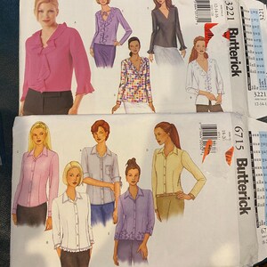 May include: Two sewing patterns for blouses. The first pattern is for a ruffled blouse with long sleeves and a V-neck. The second pattern is for a button-up blouse with long sleeves. Both patterns are from Butterick.