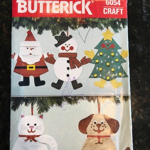 STOCKINGS for Christmas Butterick 6054  Pattern - Santa, Snowman, Christmas Tree, Kitty Cat, Puppy Dog.  Uncut