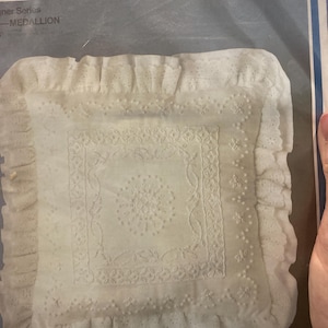 May include: A set of three ceramic mugs with a speckled, matte finish. The mugs are in shades of cream, light gray, and dark gray. Each mug has a simple, minimalist design, perfect for coffee or tea.