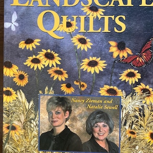 Puede incluir: Portada del libro "Landscape Quilts" con un diseño floral de girasoles y mariposas. El texto "Leisure Arts Presents" está en la parte superior. También son visibles los nombres "Nancy Zieman y Natalie Sewell". La parte inferior de la portada dice "Create Stunning Fabric Paintings".