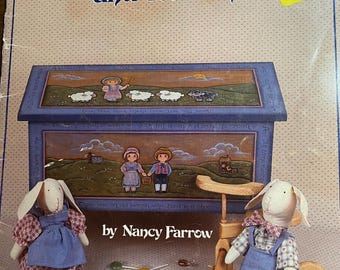 May include: A craft book cover titled "With Rhyme and Reason" with a painted box illustration and two bunny dolls. The cover features the text "by Nancy Farrow" and a "Super Saver" sticker.