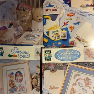 Peut inclure: Quatre modèles de point de croix pour articles de bébé. Les motifs comprennent un bébé garçon avec des ballons, une petite fille avec un lapin, un bébé garçon avec un chérubin et une petite fille avec un chérubin. Les motifs sont tous dans un cadre blanc sur fond blanc.