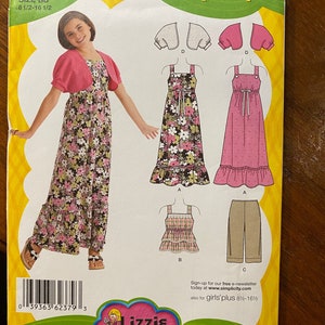 May include: Simplicity sewing pattern featuring a girl wearing a pink bolero and floral dress. The pattern includes options for dresses, a top, and pants. The pattern is for girls' sizes 8 1/2 to 16 1/2. The Lizzie McGuire Disney logo is visible.