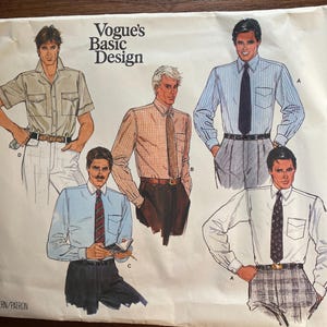May include: A vintage Vogue's Basic Design pattern sheet featuring illustrations of men's shirts and ties. The designs include short and long-sleeved shirts in various colors and patterns, with the text "Vogue's Basic Design" at the top.