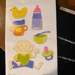 Jeu de 3 matrices Sizzix Sizzlits pour bébés et articles pour nourrissons - Pour machine à rouleaux - Création de papier, impression, fabrication de cartes - Matrice noire 3,75 x 2,5 po.