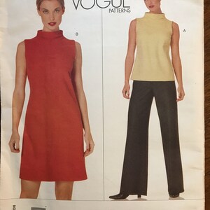 May include: Vogue Patterns sewing pattern number 2098 for a sleeveless dress and pants by Calvin Klein. The pattern includes sizes 6-8-10-12. The dress is red and the pants are black.