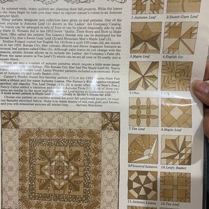 May include: A page from a quilting magazine featuring 14 different leaf-shaped quilt patterns. The patterns are labeled with names like "Autumn Leaf", "Sweet Gum Leaf", "Maple Leaf", and "English Ivy". The patterns are all in shades of brown and beige.