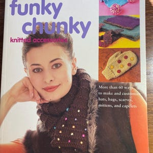 May include: A book titled "funky chunky knitted accessories" with a woman wearing a brown scarf with colorful beads on it. The book cover features a variety of knitted items, including hats, scarves, mittens, and capelets. The text on the cover reads "More than 60 ways to make and customize hats, bags, scarves, mittens, and capelets".