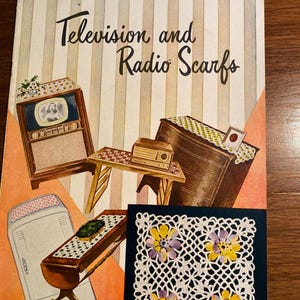 May include: A vintage book cover with the title "Television and Radio Scarfs" in bold, black lettering. The cover features illustrations of a television, a radio, and a crocheted doily with purple and yellow flowers.