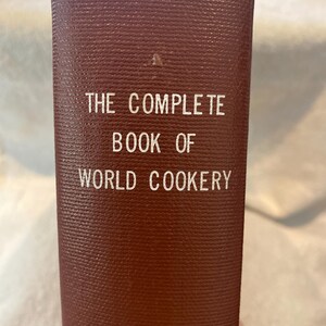 May include: A rustic wooden sign with the text "Welcome to our home" in white lettering. The sign features a distressed finish and a simple, inviting design, perfect for entryway decor.