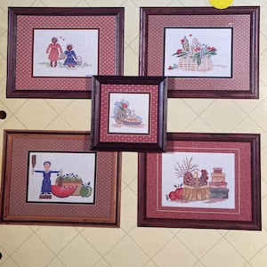 Een rommelige kast - handwerkschema kruissteek - Barbara & Cheryl - boek 20 - mand bloemen kindertaartquilts - 1985