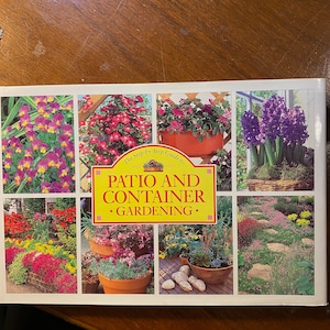 May include: A book titled "Patio and Container Gardening: The Step-by-Step Guide to" with a colorful collage of images of various flowers and plants in pots and gardens.