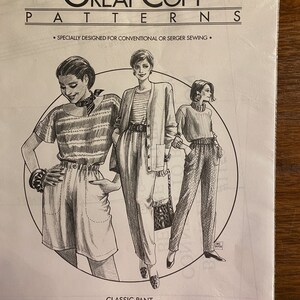 May include: A sewing pattern for classic pants, featuring three women wearing different styles of pants. The pattern is titled "Great Copy Patterns" and is number 1150. The text "Specially designed for conventional or serger sewing" is also included.