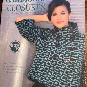 May include: A book titled "Cardigans & Closures" with a blue and black knitted cardigan on the cover. The book is by Melissa Leapman and features the text "How to" in a circle on the cover.